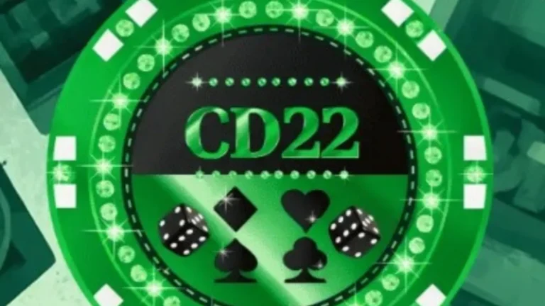CD22 game logo with green circular design, playing card symbols, and dice on a glowing background